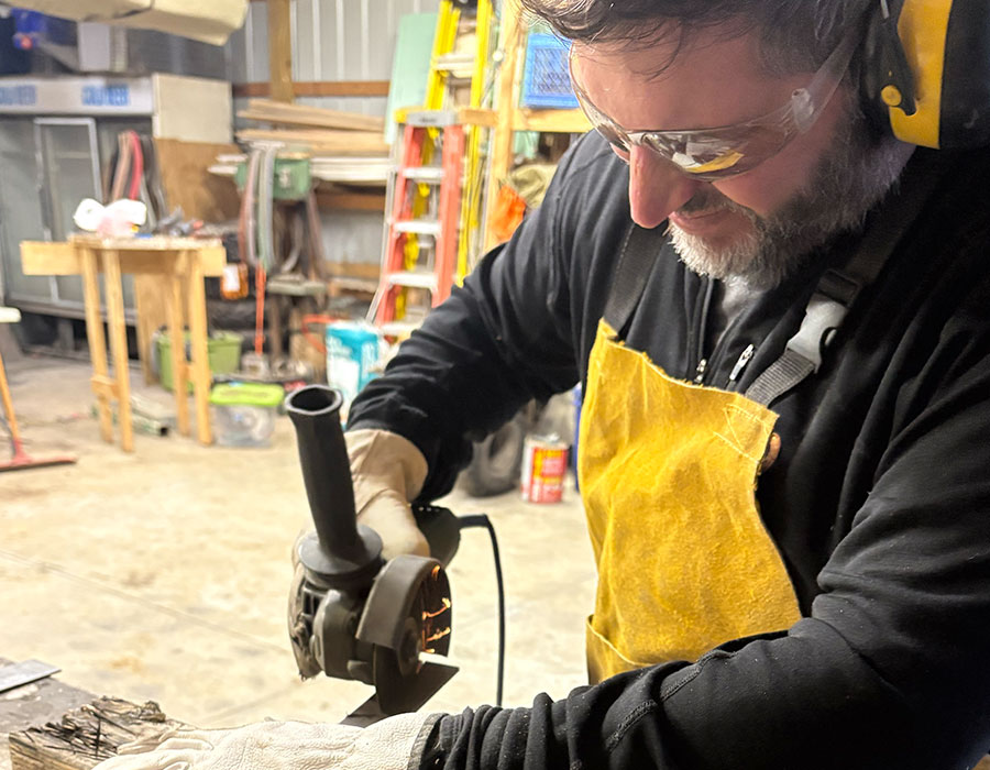 Knife maker in workshop